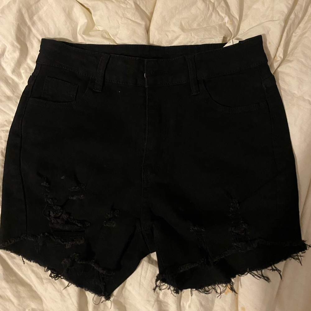 black ripped jean shorts